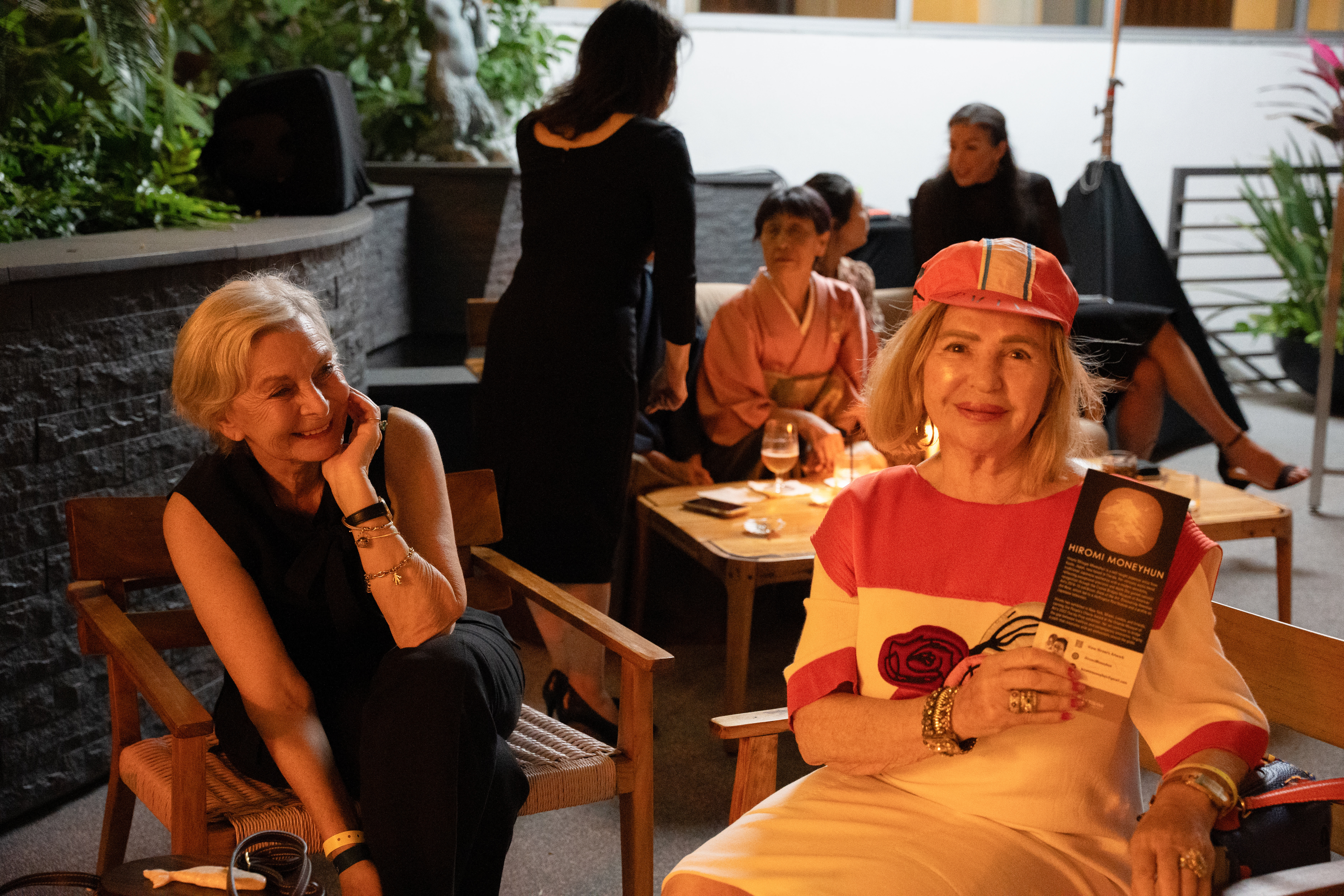 Maya A Johnson(Editor-In-Chief of Miami Palm Beach Today) on the right and one of guests of event on the left, at the Morikami Art week gathering, Nobu Hotel Eden Roc Miami Beach